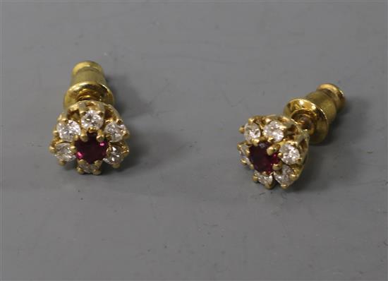 A pair of 18ct ruby and diamond cluster ear studs.